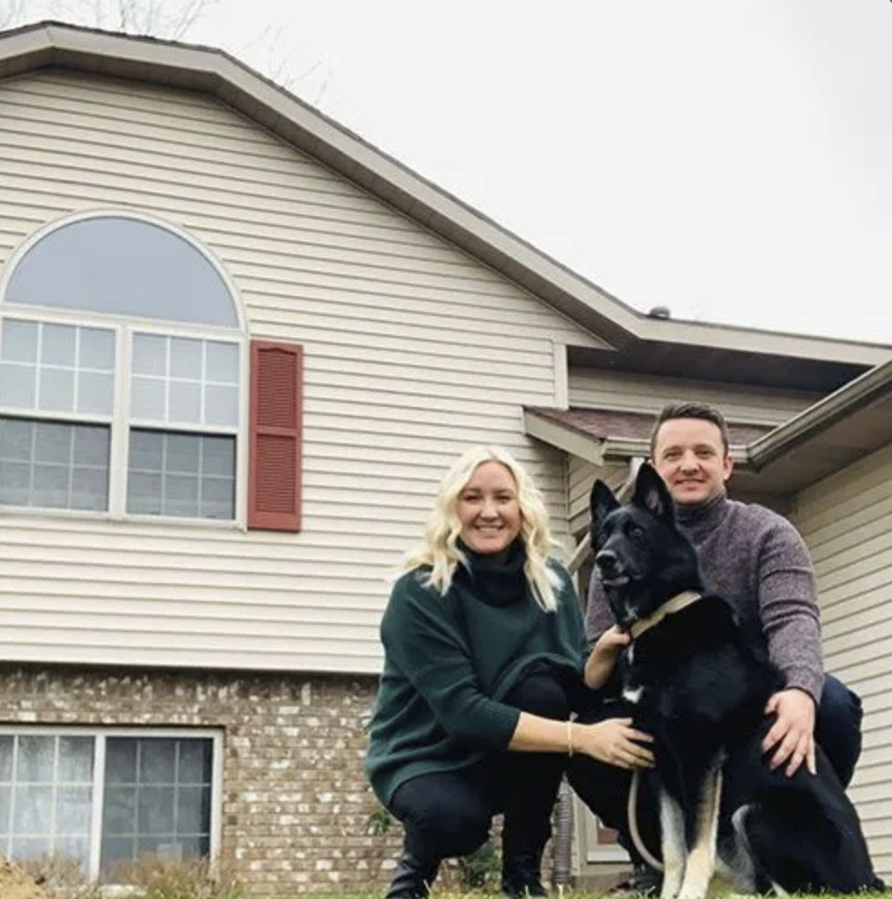 picture of Brian W. in front of a house